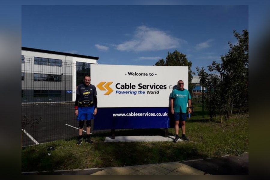 Wrexham colleagues run marathon for Nightingale House Hospice